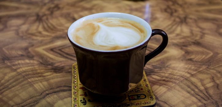 Frothy homemade cafe latte
