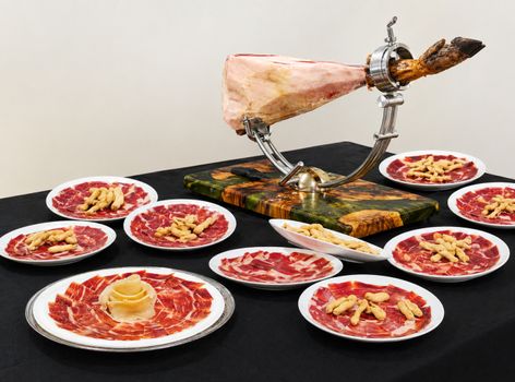 Alcachofas confitadas con jamón